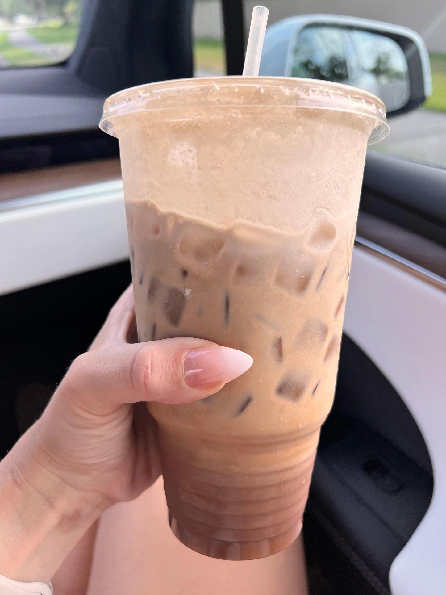 Chocolate Ice Cream Protein - My Adventure to Fit photo of chocolate ice cream protein in a cup with ice